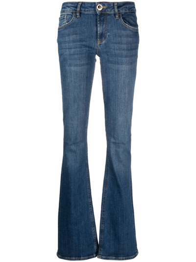 Shop Liu •jo Low-rise Flared Jeans In Blue