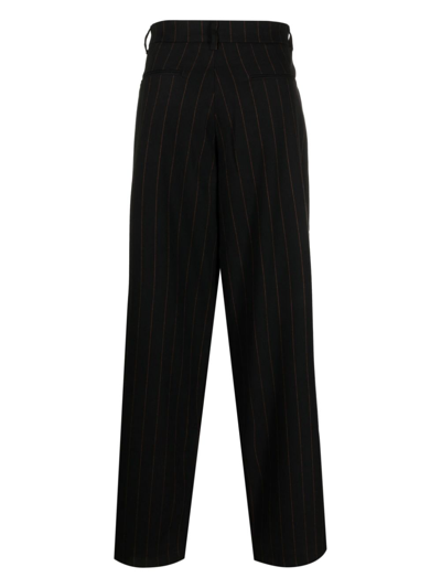 Shop Family First Pleated Pinstripe Drop-crotch Trousers In Black