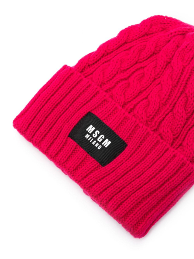 Shop Msgm Cable-knit Logo-tag Beanie In Pink