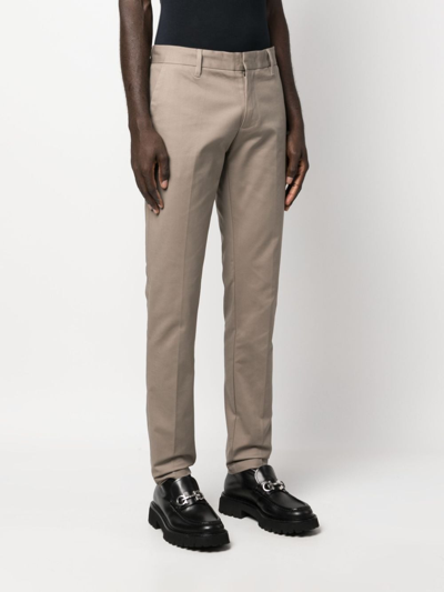 Shop Emporio Armani Pressed-crease Cotton Chino Trousers In Neutrals