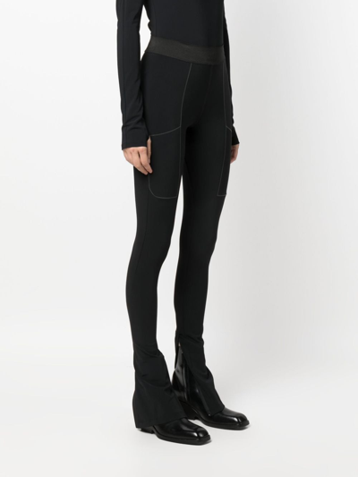 Coperni Stretch-design Slit Leggings In Black