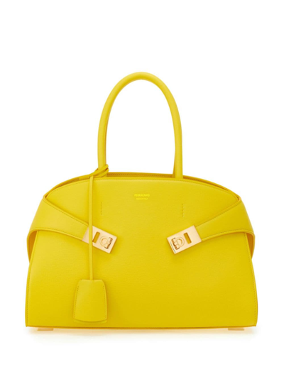 Shop Ferragamo Hug Leather Tote Bag In Yellow