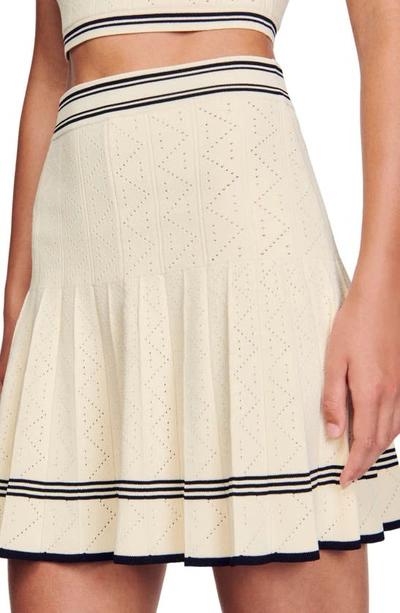 Shop Sandro Fable Pleated Pointelle Miniskirt In Ecru