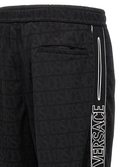 Shop Versace Logo Joggers Pants Black