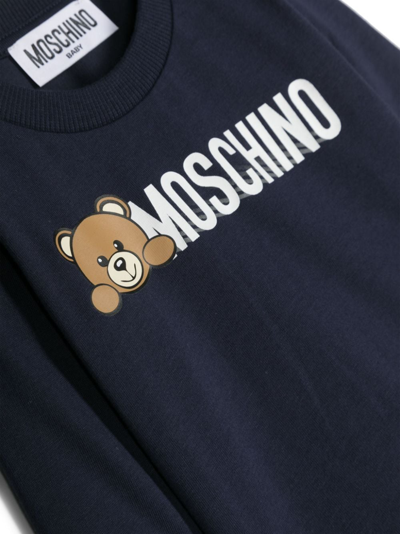 Shop Moschino Logo-print Cotton T-shirt In Blau