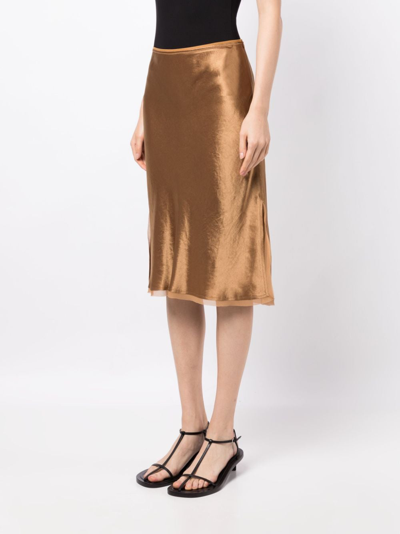 Shop Vince High-waist Satin Midi Skirt In Gold