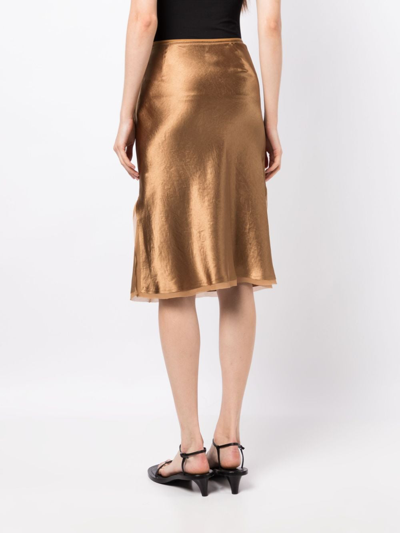 Shop Vince High-waist Satin Midi Skirt In Gold