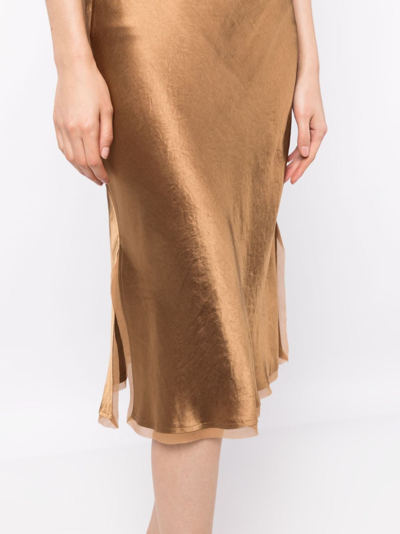 Shop Vince High-waist Satin Midi Skirt In Gold