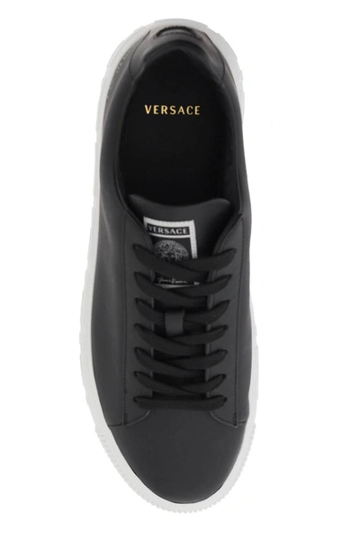 Shop Versace 'greca' Sneakers In Black