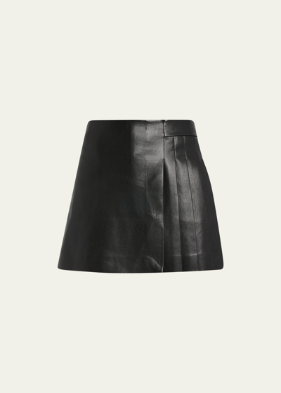 Shop Alice And Olivia Toni Vegan Leather Asymmetric Pleated Mini Skirt In Black