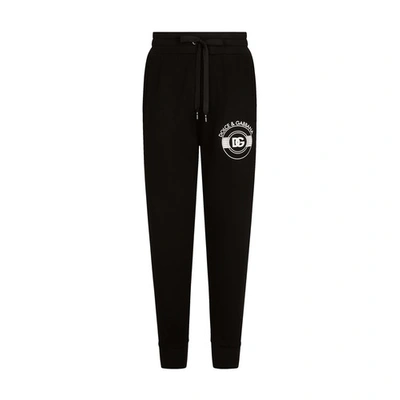 Shop Dolce & Gabbana Jogging Pants In Jersey With Dg Logo Print In Black