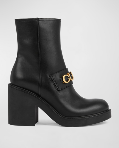 Shop Gucci Cara Leather Logo Heeled Booties In Black