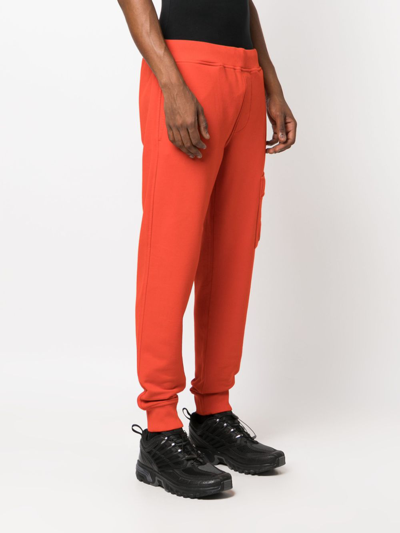Shop C.p. Company Lens-detail Cotton Track Pants In Orange