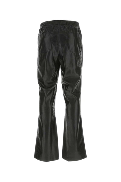 Shop Nanushka Pants In Black