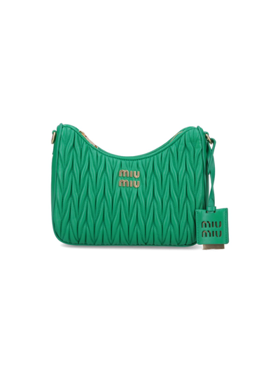 Shop Miu Miu Matelassé Shoulder Bag In Green
