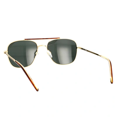 Shop Calvin Klein Sunglasses In Gold