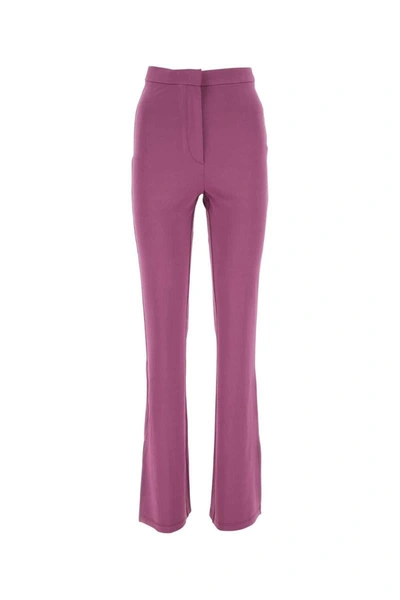 Shop Remain Pants In Purple