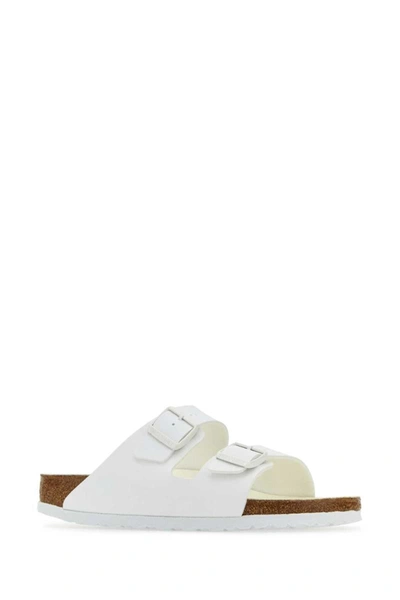 Shop Birkenstock Slippers In White