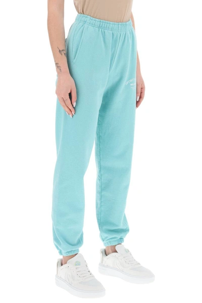 Shop Sporty And Rich Sporty Rich Jogger Pants With Printed Logo In Blue