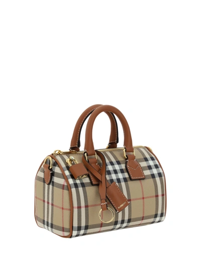 Shop Burberry Coated Canvas Handbag With Check Motif