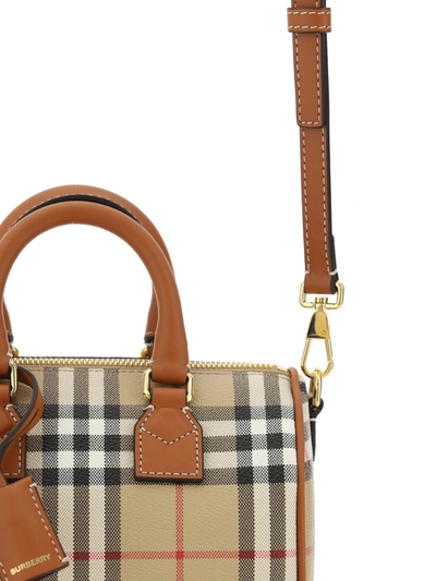 Shop Burberry Coated Canvas Handbag With Check Motif
