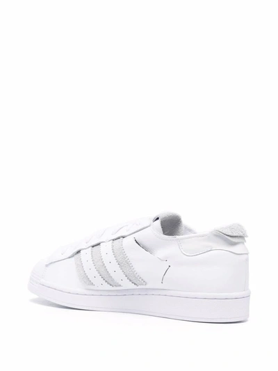 Shop Adidas Originals Adidas Superstar Sneakers In White