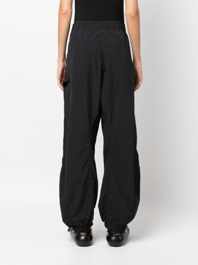 Shop Jw Anderson Logo-embroidered Wide-leg Trousers In Black