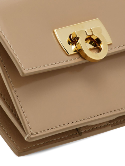 Ferragamo Gancini Compact Wallet In Neutrals