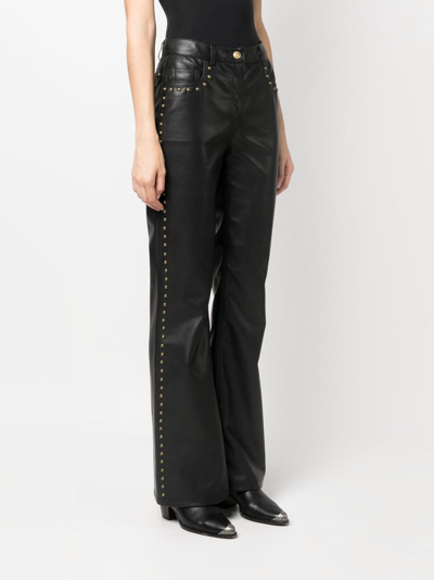 Moschino Stud-detail Mid-rise Trousers In Black