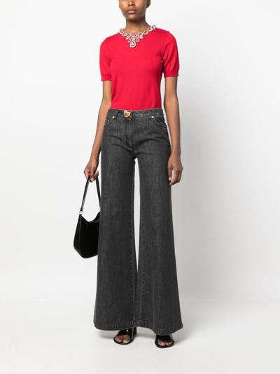 Moschino Flared-design Jeans In Black