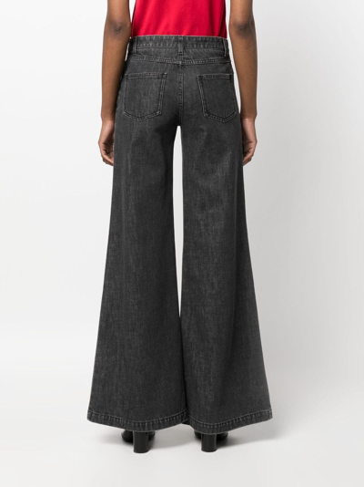 Moschino Flared-design Jeans In Black
