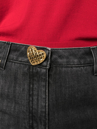 Moschino Flared-design Jeans In Black