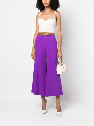 Shop Valentino Cropped Flared Silk Trousers In Purple