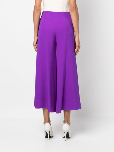 Shop Valentino Cropped Flared Silk Trousers In Purple