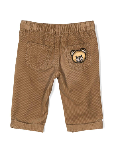 Shop Moschino Teddy Bear-patch Corduroy Trousers In Brown