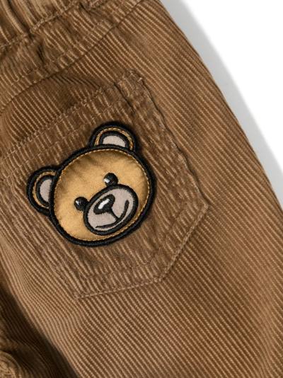 Shop Moschino Teddy Bear-patch Corduroy Trousers In Brown