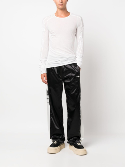 Shop Amiri Side-stripe Wide-leg Trousers In Black