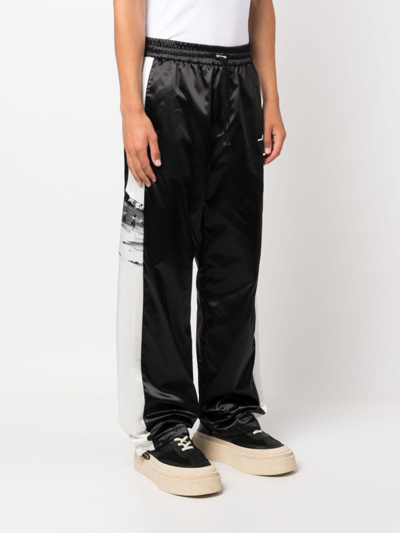 Shop Amiri Side-stripe Wide-leg Trousers In Black