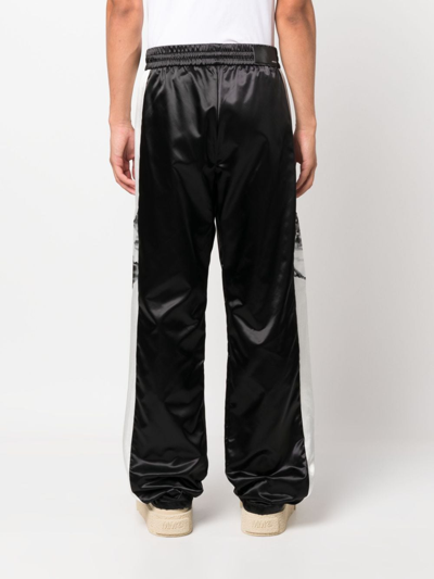 Shop Amiri Side-stripe Wide-leg Trousers In Black