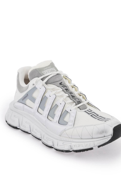 Shop Versace 'trigreca' Sneakers In Silver,white