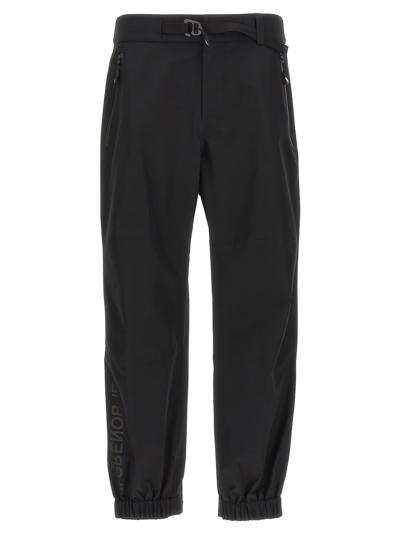 Shop Moncler Nylon Pants In Black