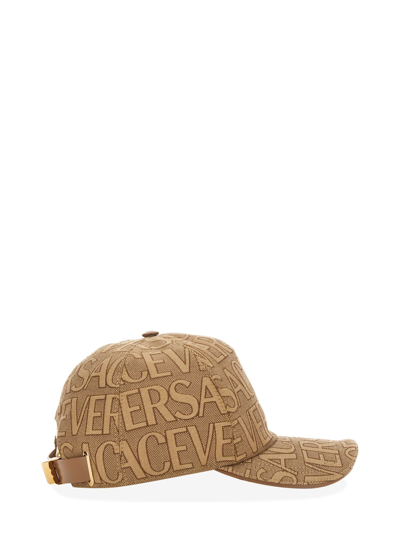 Shop Versace Baseball Cap In Beige