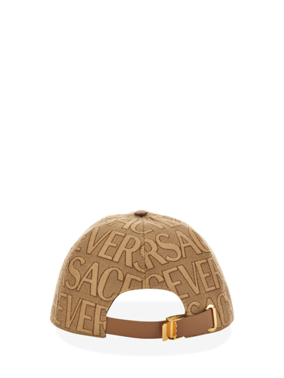 Shop Versace Baseball Cap In Beige