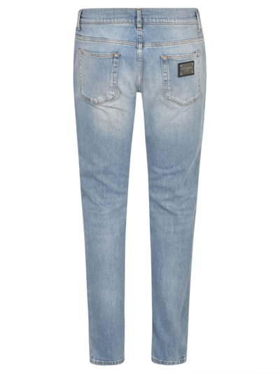Shop Dolce & Gabbana Rip Detail Jeans In Variante Abbinata