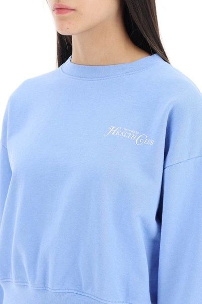 Shop Sporty And Rich Sporty Rich 'ny Country Club' Cropped Crewneck Sweatshirt In Blue