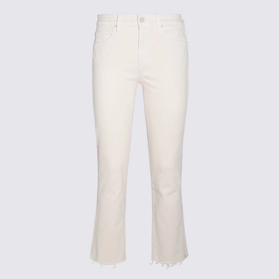 Shop Mother Cream Denim The Raskal Ankle Snipped Jeans In White