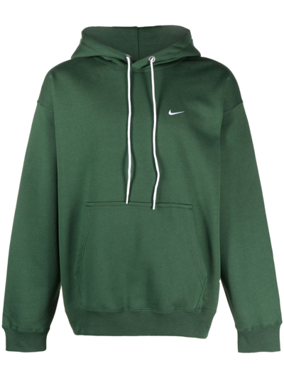 Shop Nike Solo Swoosh Hoodie In Green