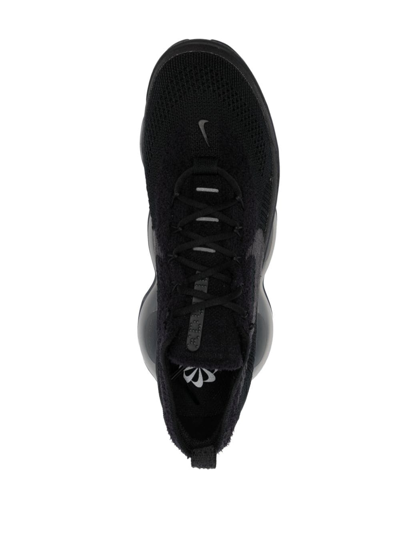 Shop Nike Air Max Scorpion Flyknit Sneakers In Black