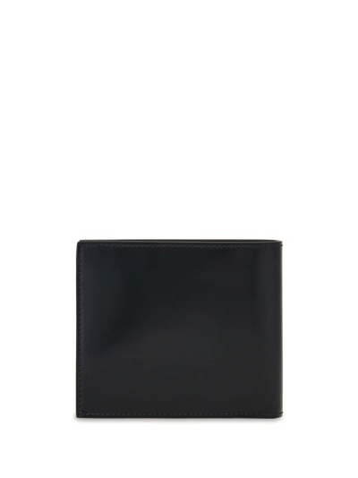 Ferragamo Logo-embossed Bi-fold Wallet In Black