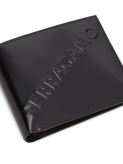 Ferragamo Logo-embossed Bi-fold Wallet In Black